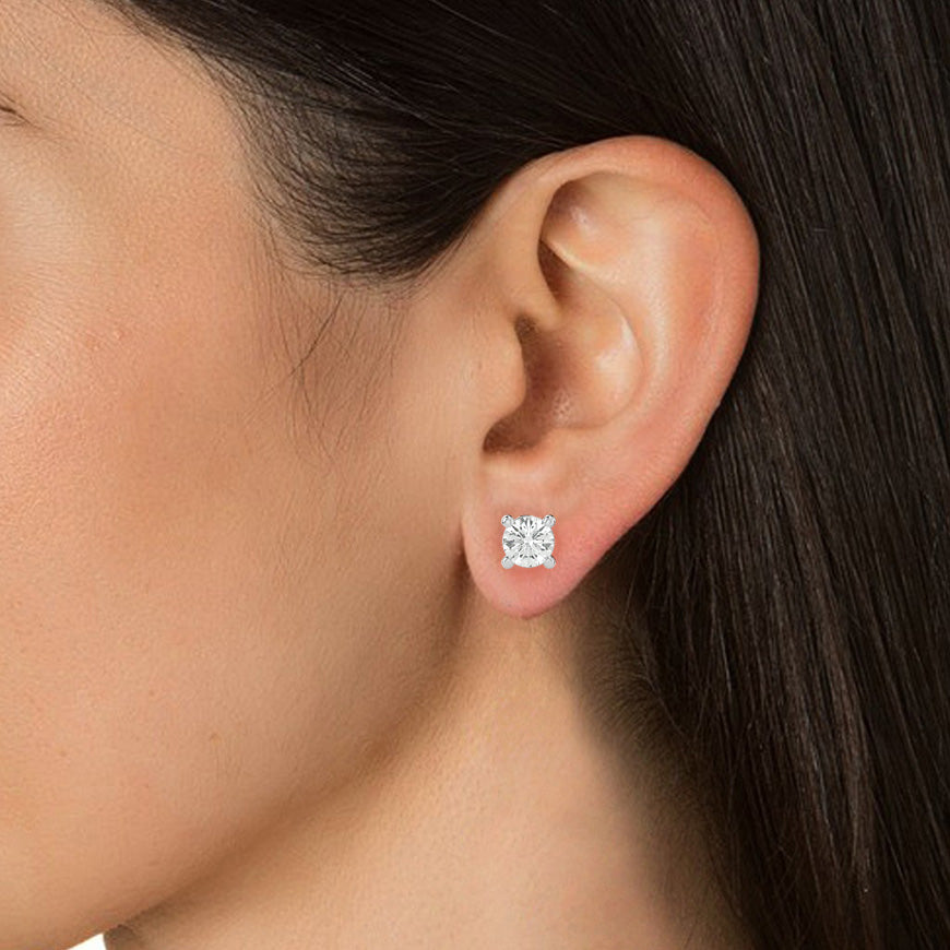 Women wearing Nice diamond earrings 
